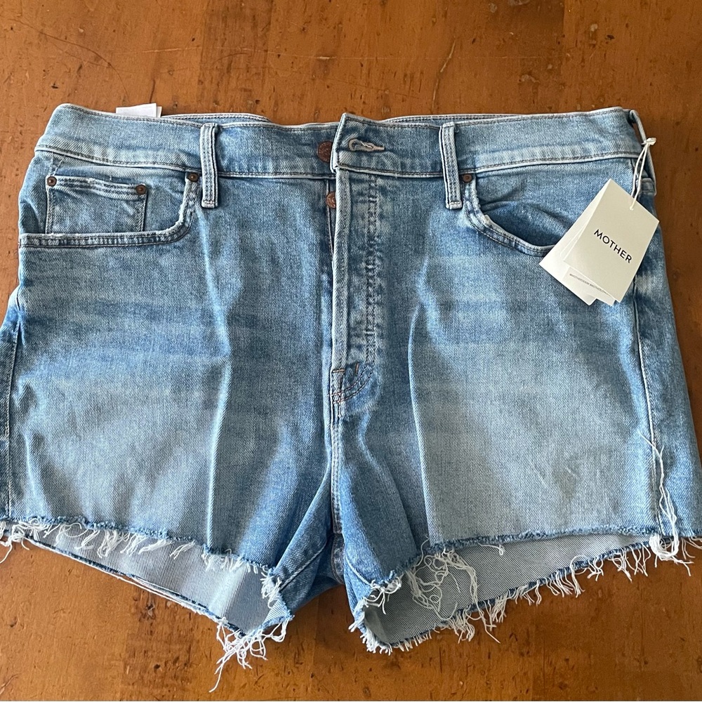 MOTHER Blue Jean Shorts with Distressed Hem
